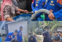 Direktorat Kepolisian Perairan dan Udara Polda Jambi menyalurkan ribuan liter air bersih kepada Warga yang terdampak kekeringan akibat kemarau di Kabupaten Muaro Jambi. Dok: Istimewa